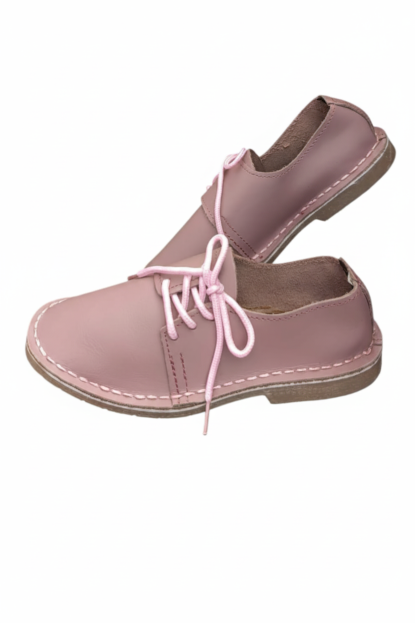 Ladies leather side lace vellies in dusty pink on a white background