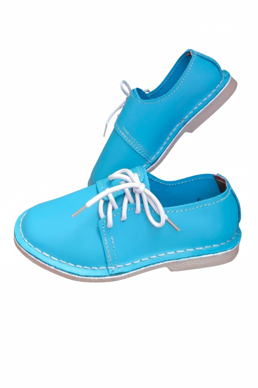 Ladies leather side lace vellies in turquoise on a white background