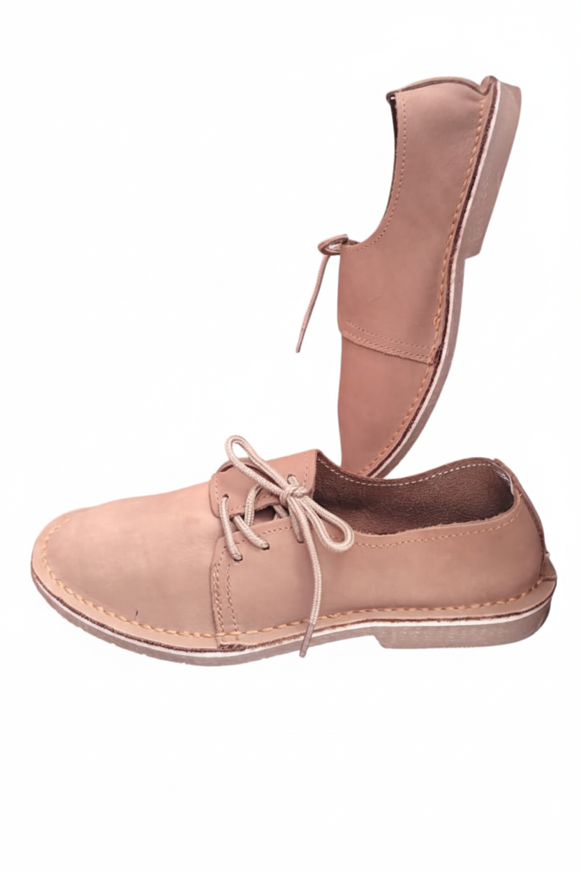 Ladies leather side lace vellies in nubuck tan on a white background, side view