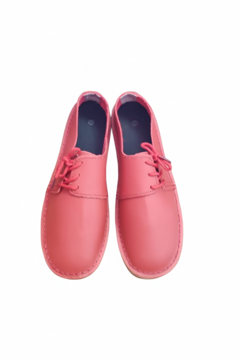Ladies leather side lace vellies in red on a white background, front view
